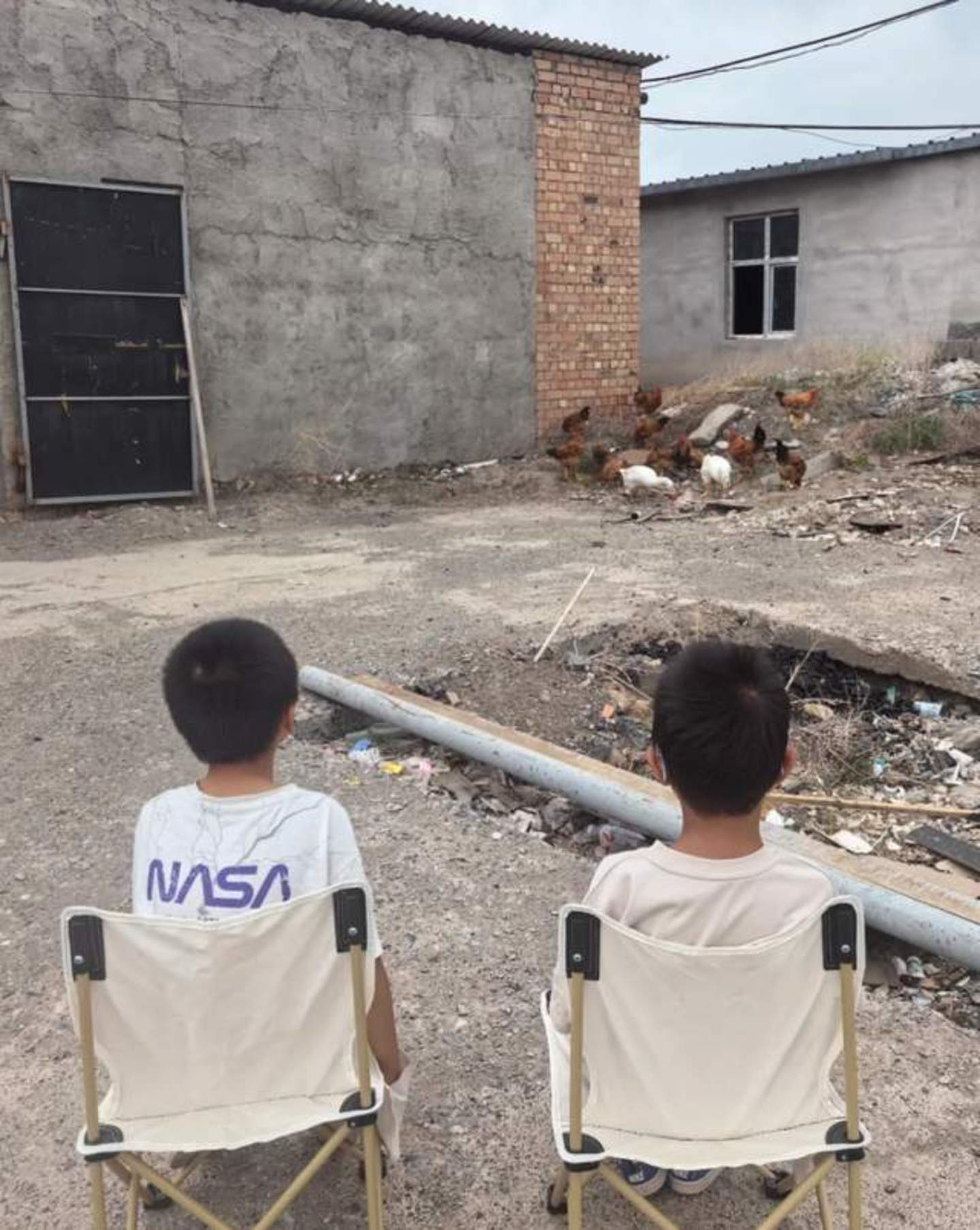 Children looking into distance outdoors